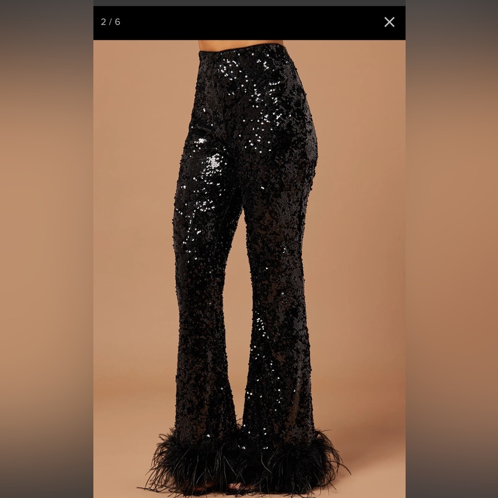 Dania Sequin Feather blazer and Pant - Black
Pant: XS blazer:S NWT - Picture 3 of 4